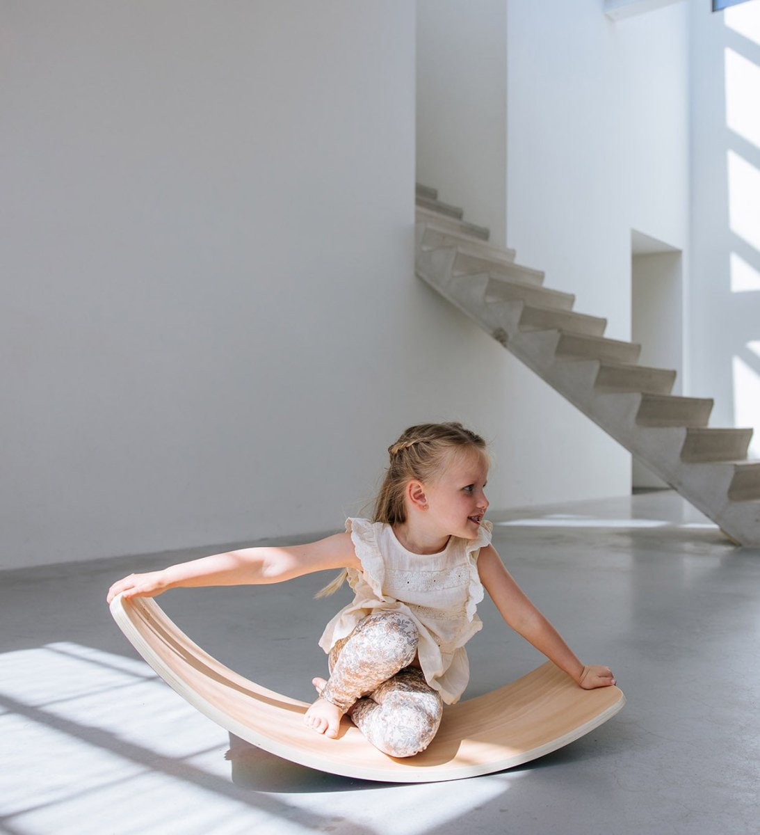 houten balance board met paars vilt