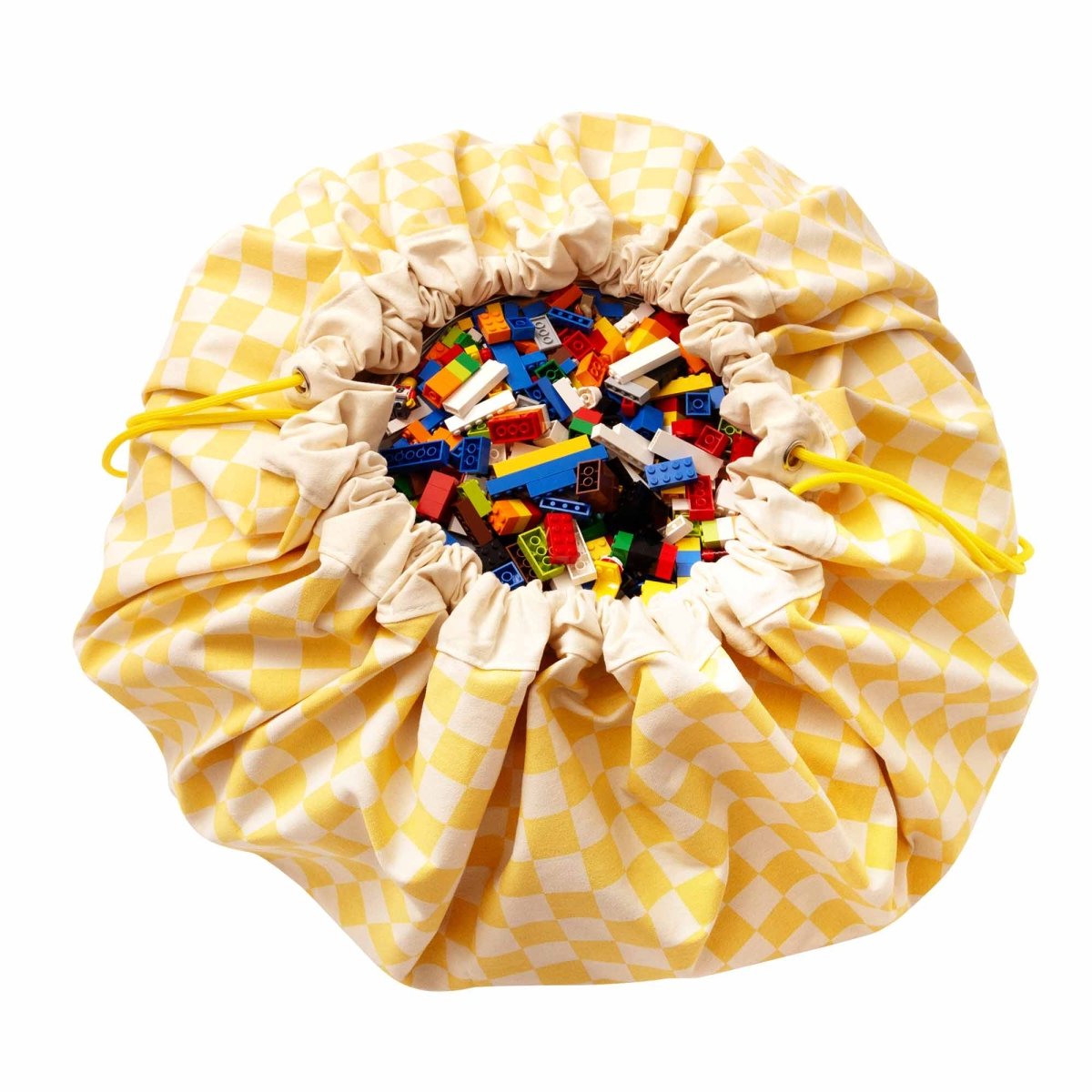 Play&Go Vichy Yellow speelkleed uitgevouwen in een kinderkamer