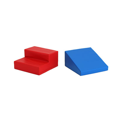 Two red and blue boxes on a white surface transformed into an IGLU Soft Play Mini Fun Slider playset for smaller spaces.