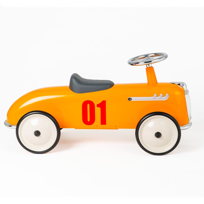 Vintage running car orange - roadster racing car