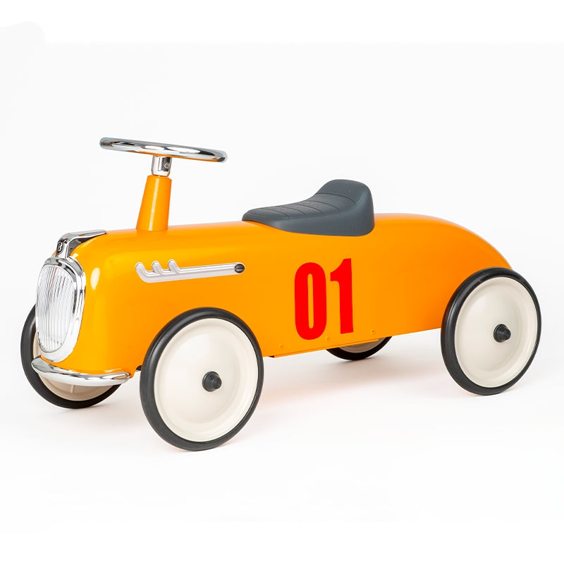 Vintage running car orange - roadster racing car