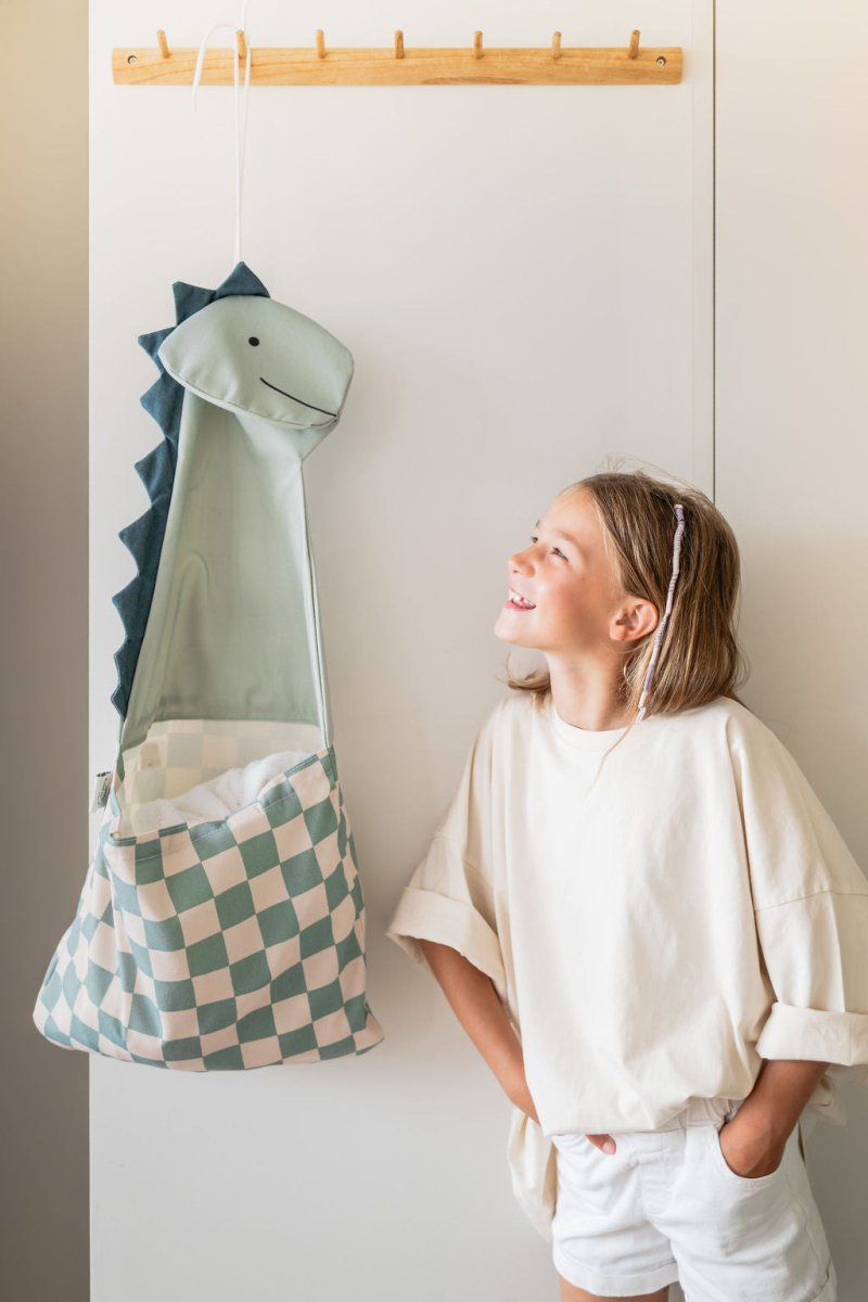 Toto Dino zugezogen als Tragetasche für unterwegs