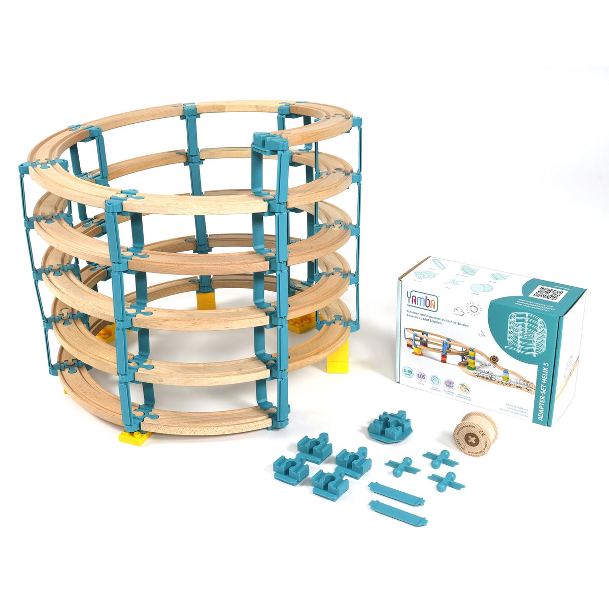 Aufgebaute Yamba Helix 5 mit Holzschienen auf fünf Ebenen neben der Verpackung